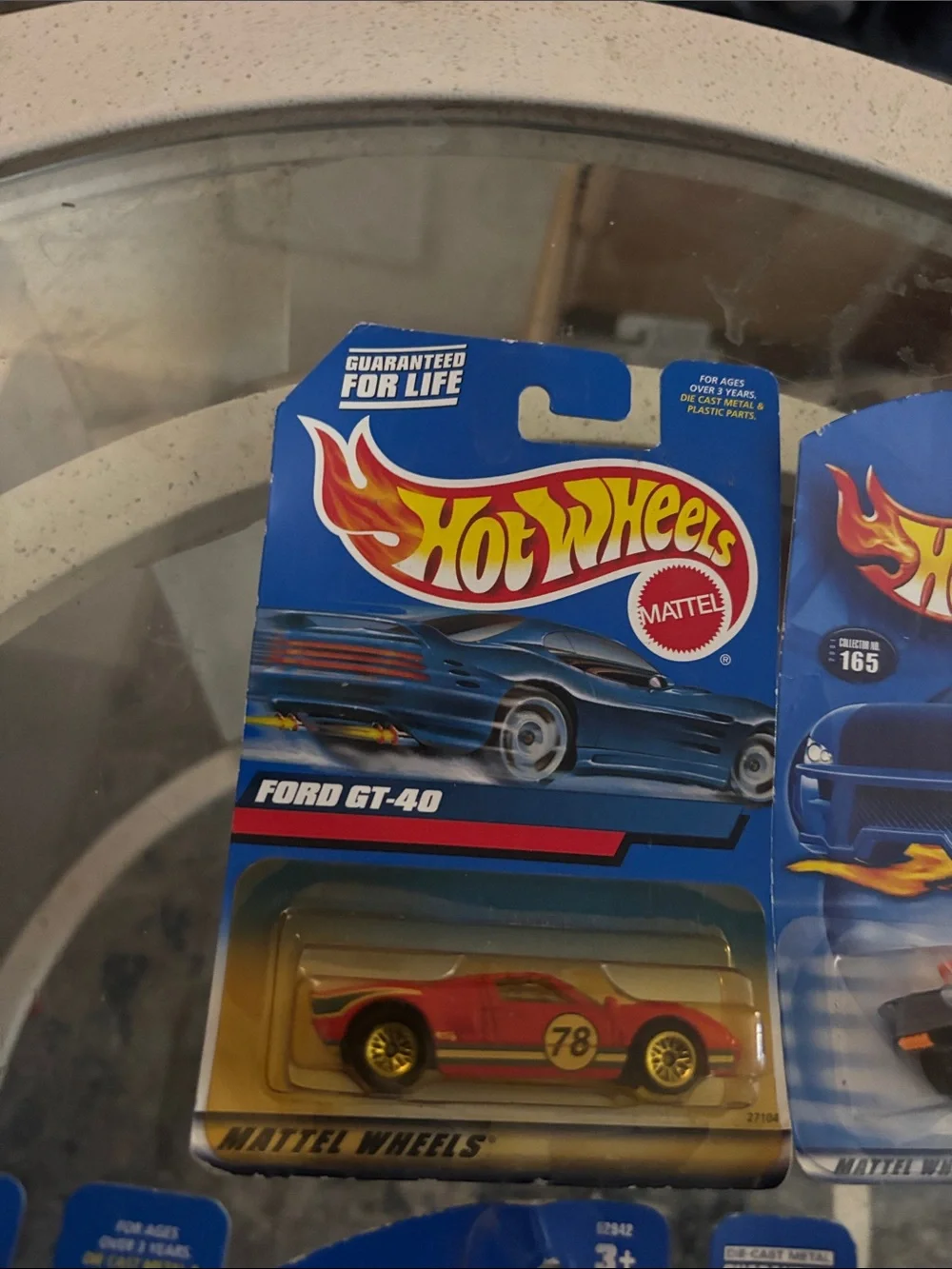 10 Hot Wheels cars in packaging
